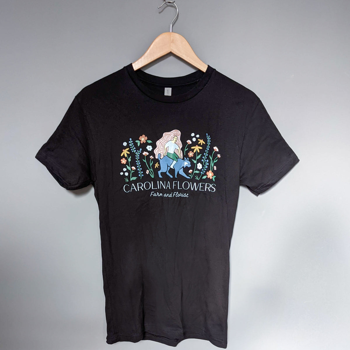 Unisex Black T-Shirt with Carolina Flowers Logo
