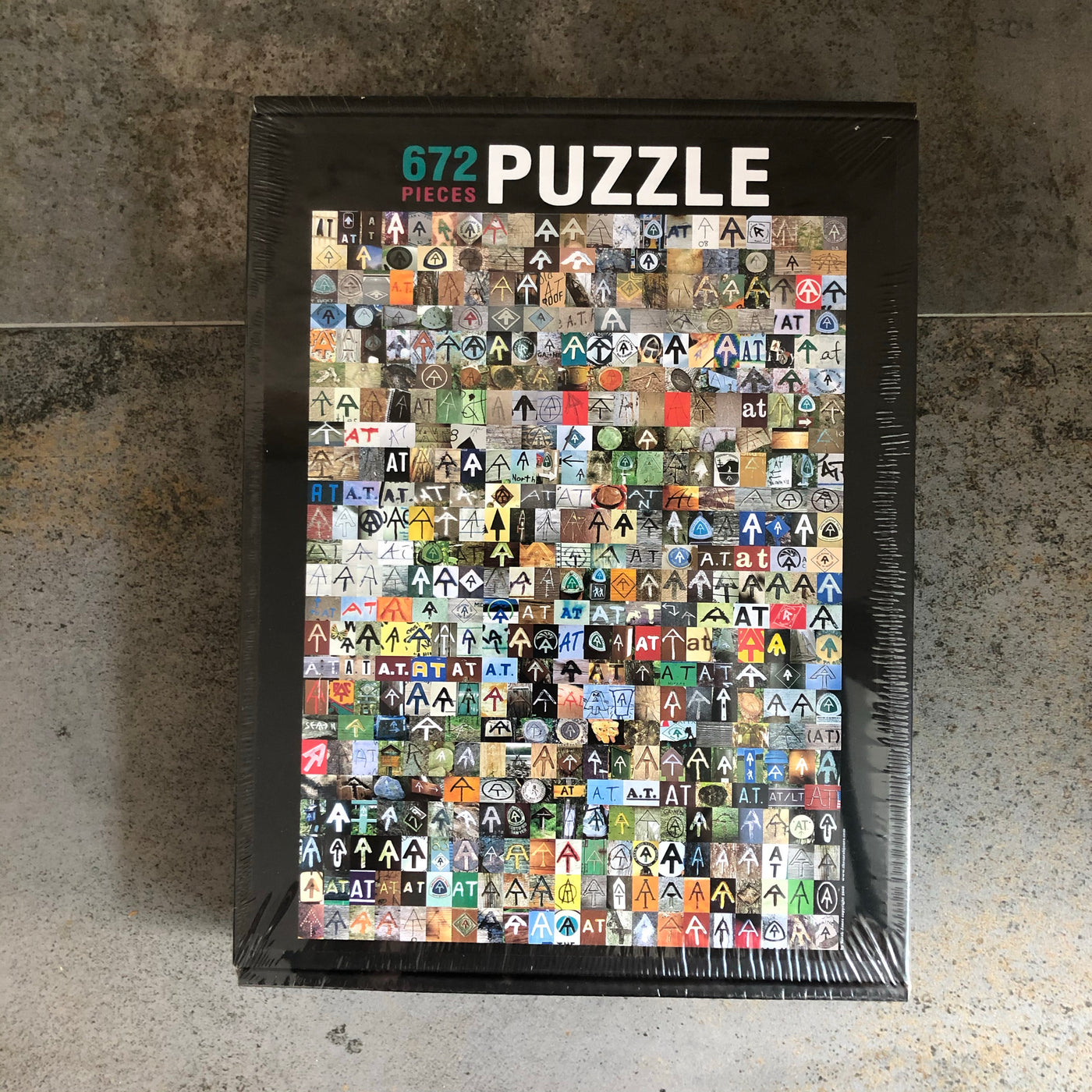 The AT Poster Puzzle by Sarah Jones Decker, 672 Pieces